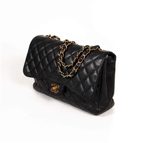 Black Quilted Caviar Leather Classic Jumbo Single Flap Bag.